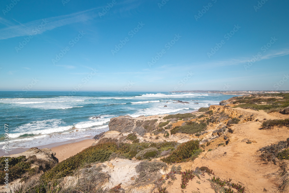 Breathtaking rocky environment on Atlantic Coast on a sunny day in the Odemira region, western Portugal. Wandering along the Fisherman Trail, Rota Vicentina Breathtaking rocky environment on Atlantic Coast on a sunny day in the Odemira region, western Portugal. Wandering along the Fisherman Trail, Rota Vicentina