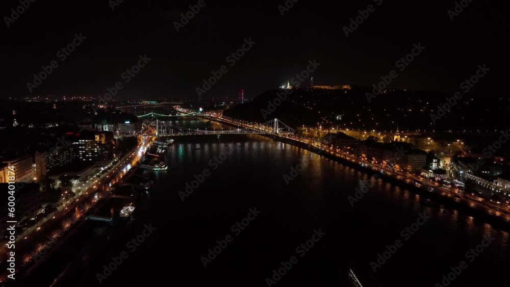 Budapest Elisabeth Bridge, the third newest bridge of Budapest, Hungary, connecting Buda and Pest across the River Danube. Aerial view at night, the largest city in Hungary Budapest Elisabeth Bridge, the third newest bridge of Budapest, Hungary, connecting Buda and Pest across the River Danube. Aerial view at night, the largest city in Hungary