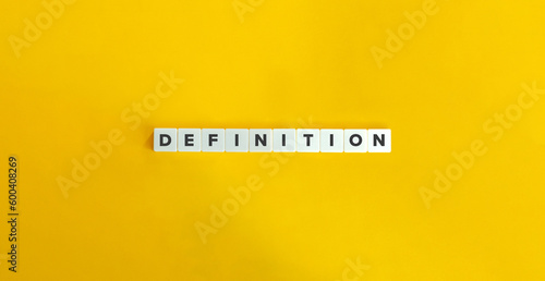 Definition Word and Banner. Letter Tiles on Yellow Background. Minimal Aesthetics. photo