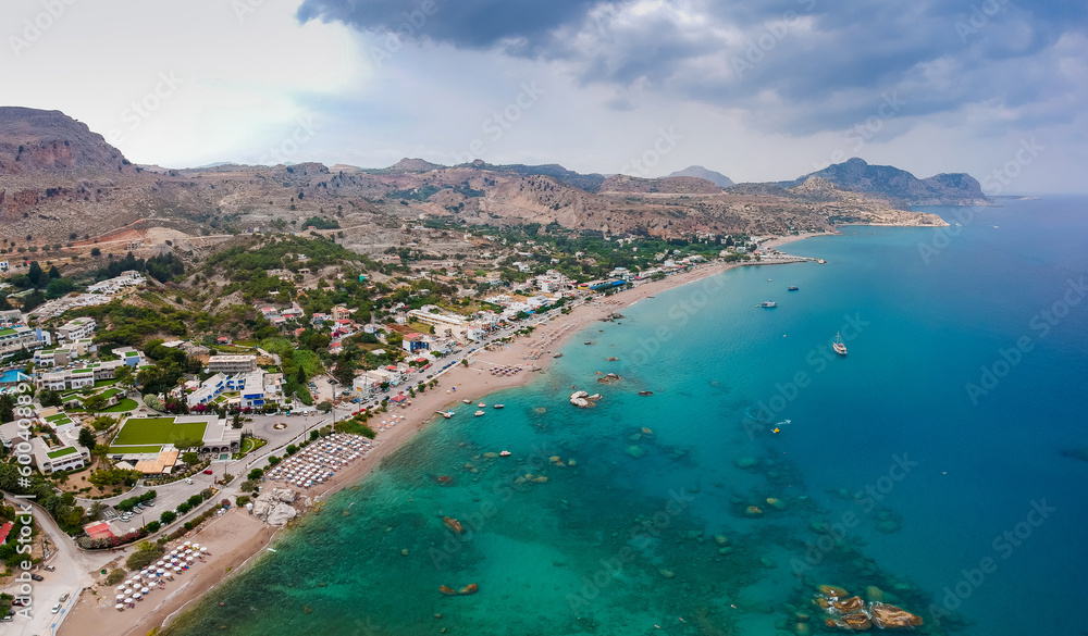 Aerial birds eye view drone photo beach on Rhodes island, Dodecanese, Greece. Panorama with nice lagoon and clear blue water. Famous tourist destination in South Europe