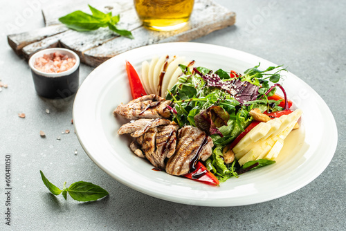 Healthy green salad with crispy fried meat and fresh vegetables. Concept healthy and balanced eating. place for text, top view