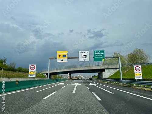 Italian highway with toll station sign.