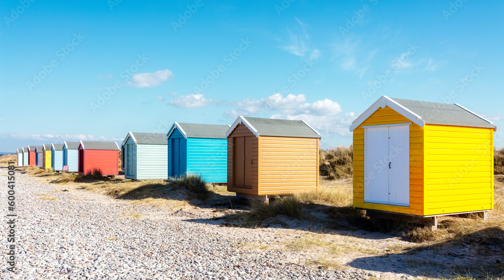 Beach huts or bathing houses on the beach background