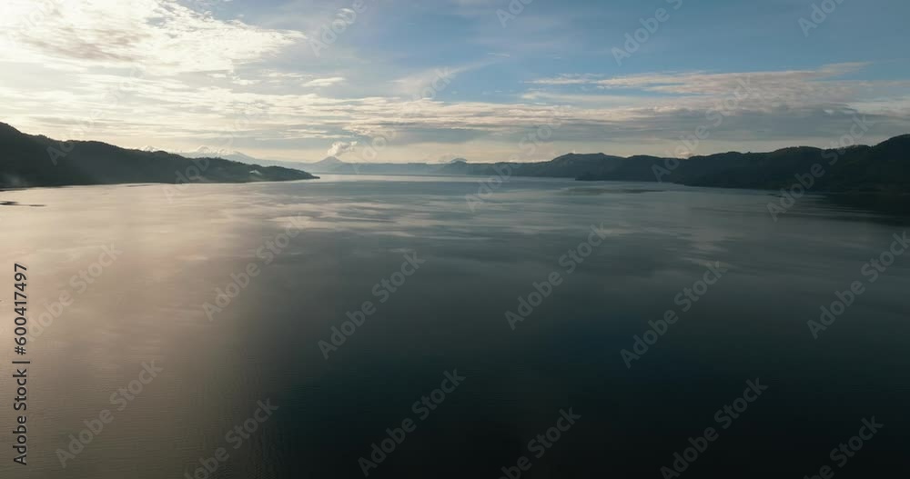 Aerial drone of lake Toba and Samosir Island at sunset. Sumatra, Indonesia. Aerial drone of lake Toba and Samosir Island at sunset. Sumatra, Indonesia.