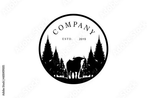 Angus Cow Cattle Buffalo Bull Longhorn Silhouette at Pine Fir Conifer Evergreen Tree Forest for Farm Livestock Ranch logo design