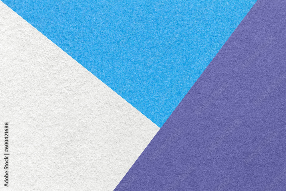 Texture of craft white, blue and violet shade color paper background, macro. Structure of vintage abstract cardboard Texture of craft white, blue and violet shade color paper background, macro. Structure of vintage abstract cardboard