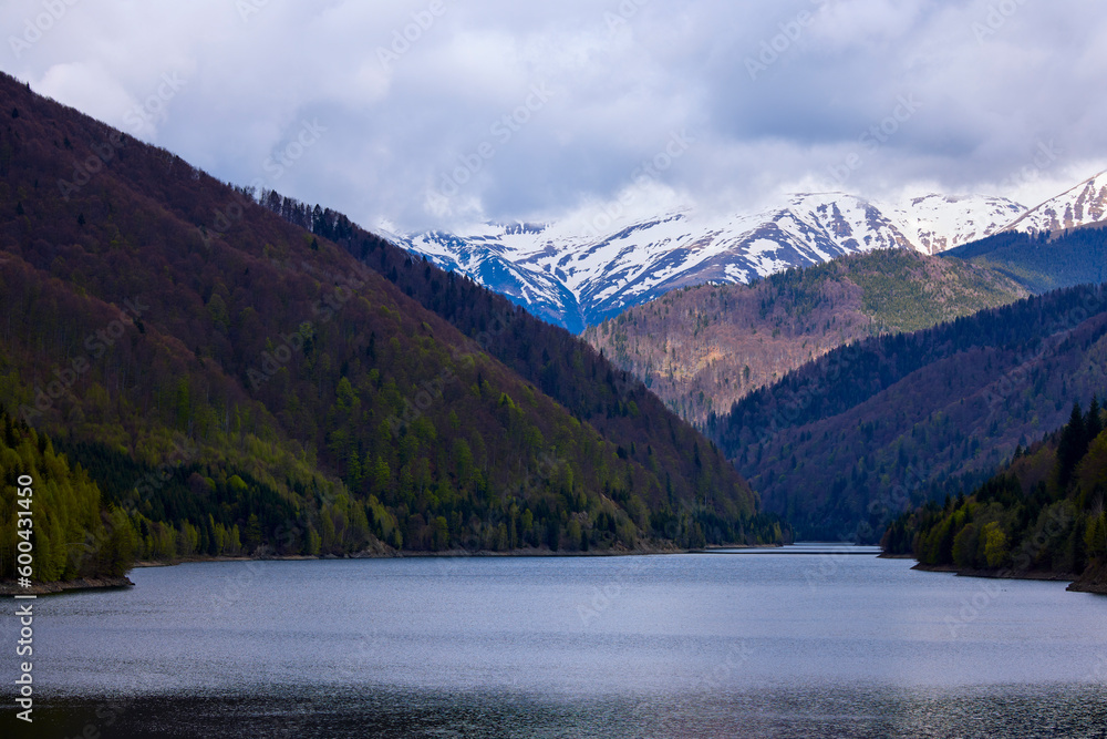 landscape with a lake and mountain in the Carpathian mountains of Romania