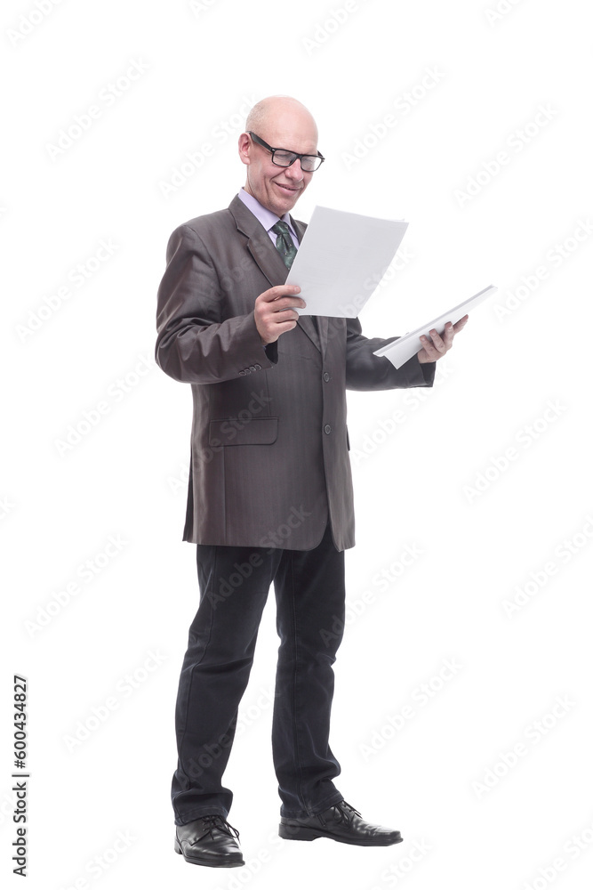 in full growth. business man with a stack of documents. in full growth. business man with a stack of documents.