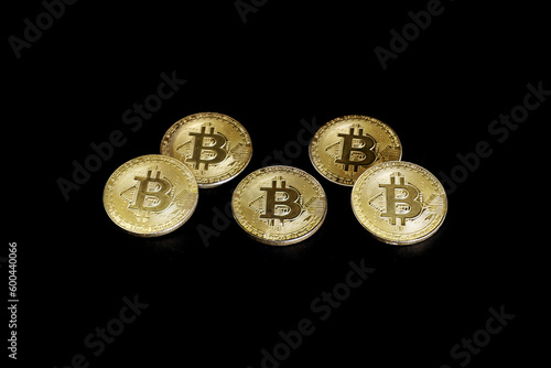 gold bitcoin on back background © amonphan