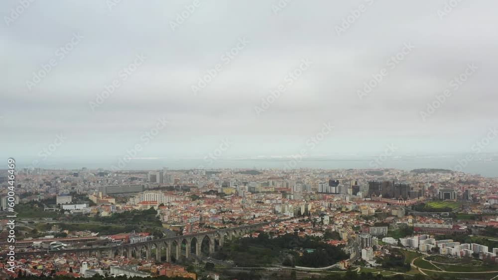 Aqueduct and road traffic in Lisbon, Portugal, Europe Autumn day Aqueduct and road traffic in Lisbon, Portugal, Europe Autumn day