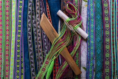 hand weaving tool on colored weave straps