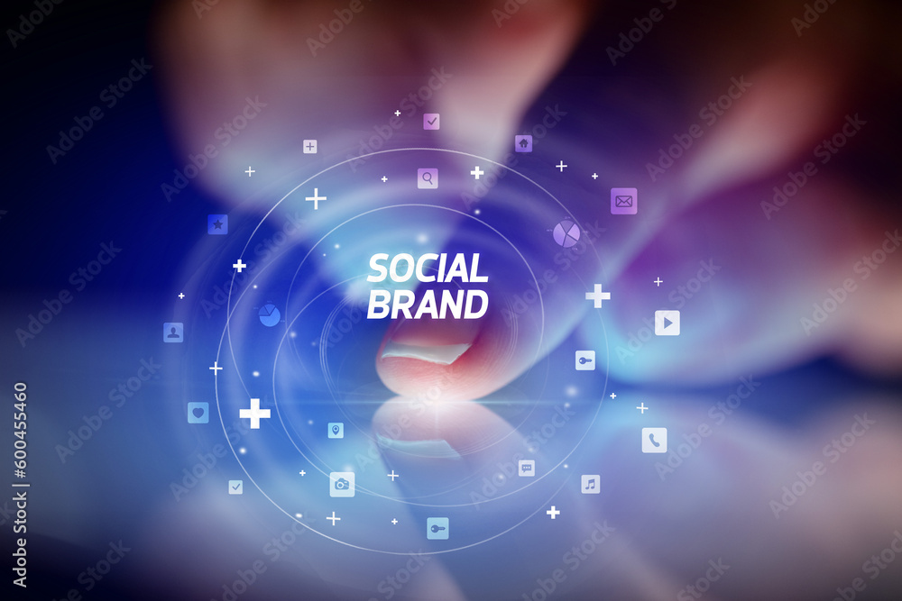 Finger touching tablet with social media icons concept Finger touching tablet with social media icons concept