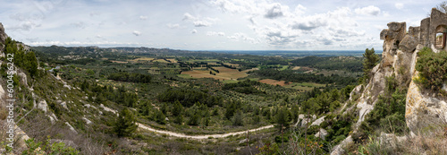 Baux-De-Provence, France - 04 21 2023: View from the sheer flanks of Plateau de Costapera in a village in Provence. photo