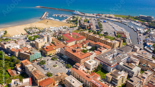 Fototapeta Naklejka Na Ścianę i Meble -  Aerial view of the port of Terracina, in the province of Latina, Italy. In foreground is the town of Terracina.
