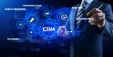 CRM Customer relationship management concept. Businessman pressing button on screen.