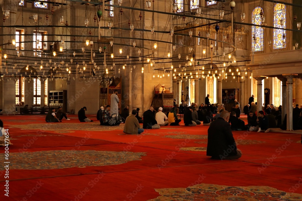Istanbul, Turkey. 04.29.2023. A Muslim scholar gives a faith lesson inside Fatih Mosque.
