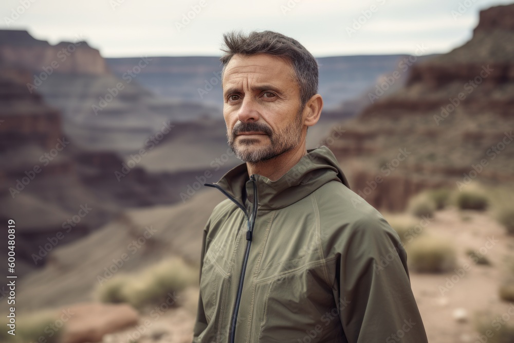 Handsome middle-aged man hiking in Grand Canyon National Park, Arizona, USA
