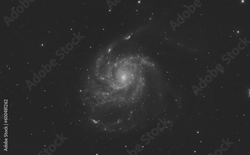 The whirlpool galaxy in ursa major constellation, and some stars in the background taken with my telescope in luminance.