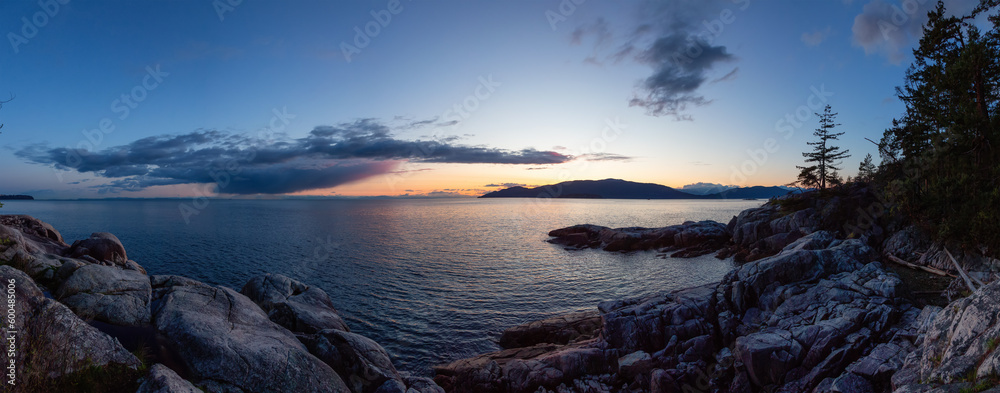 Rocky Shore on West Coast of Pacific Ocean. Lighthouse Park in West Vancouver, British Columbia, Canada. Sunset Sky.