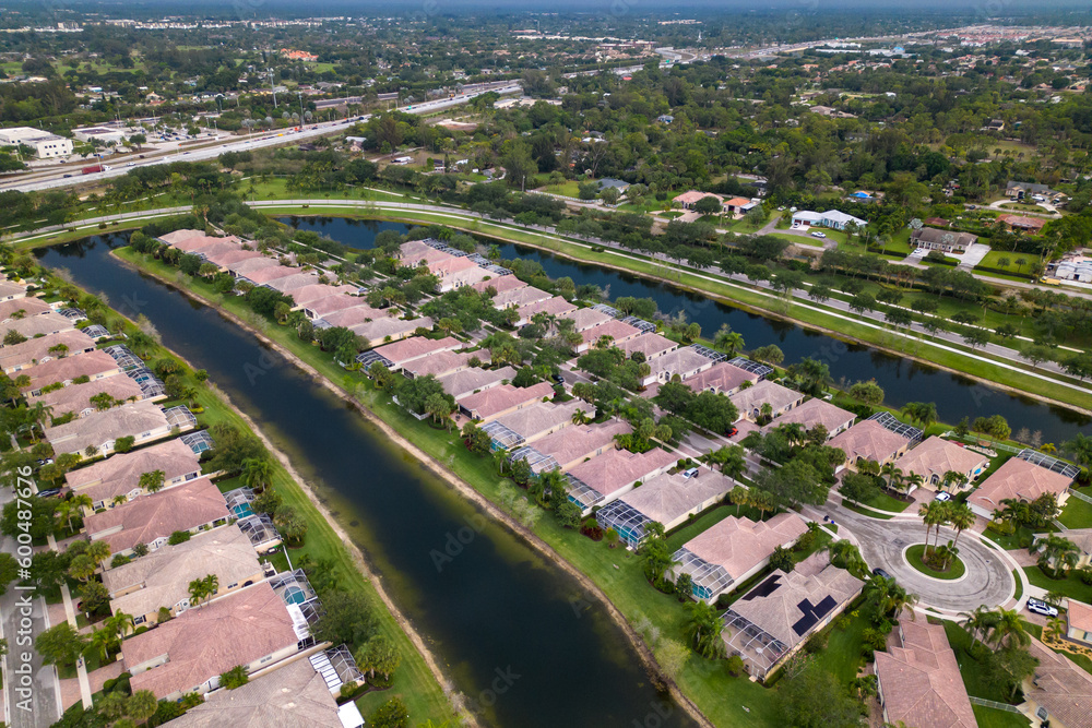 A neighborhood with river and palms in Florida. 