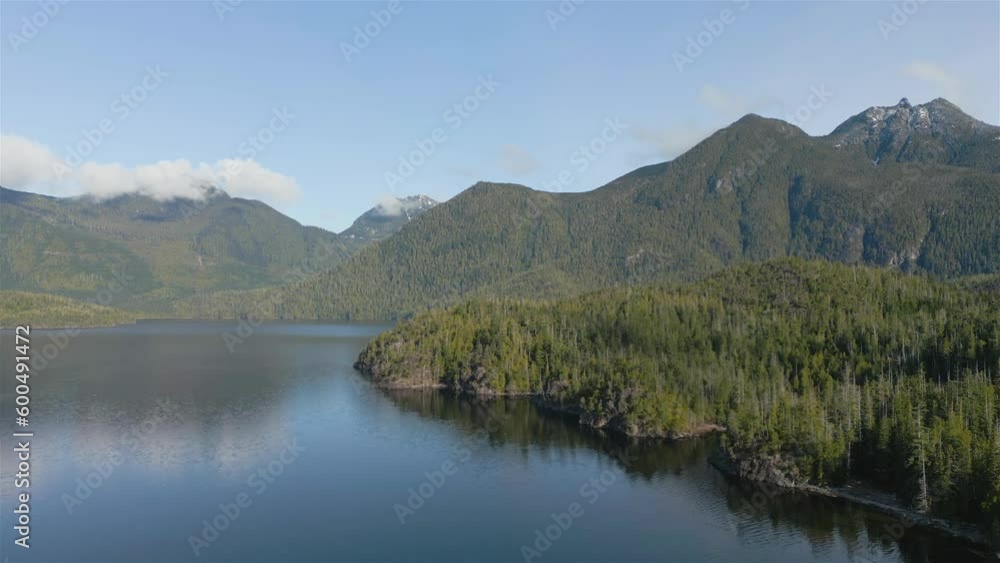 Aerial View of Canadian Mountain Landscape and Lake. Taken in Vancouver Island, British Columbia, Canada. Nature Background. Cinematic Aerial View of Canadian Mountain Landscape and Lake. Taken in Vancouver Island, British Columbia, Canada. Nature Background. Cinematic