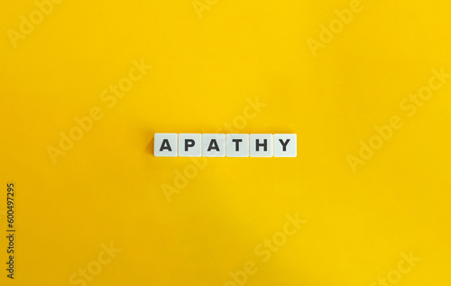 Fotografi Apathy Word on Letter Tiles on Yellow Background