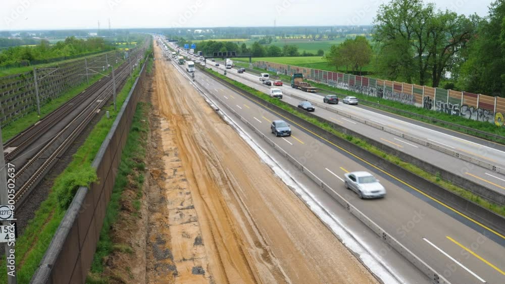Construction site and dense traffic on highway Construction site and dense traffic on highway