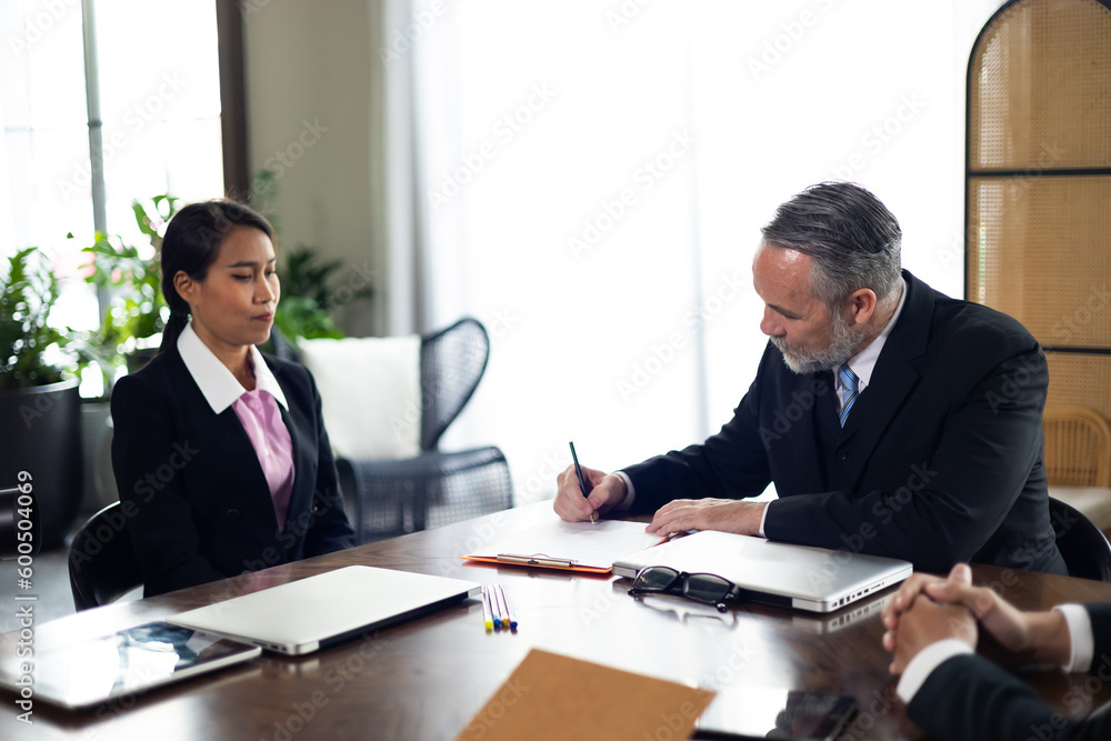 ceo senior man. Business contract and agreement concept. Senior business man and young business asian man signing contract for investment or buy estate and insurance ceo senior man. Business contract and agreement concept. Senior business man and young business asian man signing contract for investment or buy estate and insurance