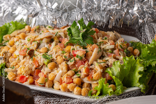 cod salad with chickpeas. dish served at Festive dinner. Festive Salad.