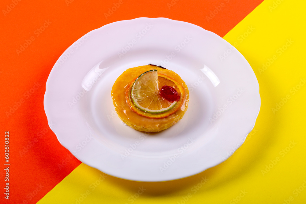 Cheese cake with marmalade and lime and orange slices Cheese cake with marmalade and lime and orange slices