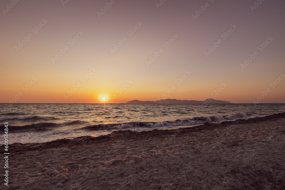 Obraz premium sunset at the beach in kos