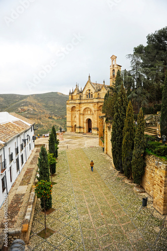 Antequera: Saint Mary the Greater Collegiate Church (16th century) seen from the Alcazaba. Antequera is a town in the province of Malaga located in the heart of Andalusia, Spain