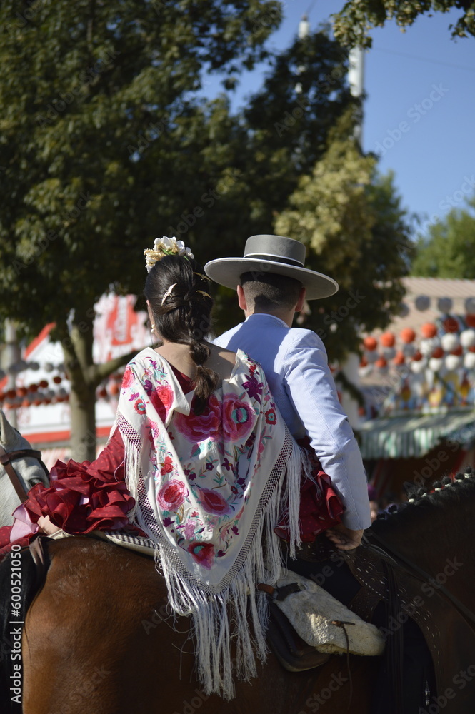 A couple dressed with the typical costumes of the world famous 'Feria de abril' of Seville,  Spain 