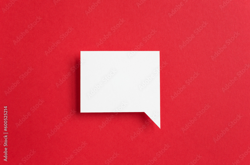 paper speech bubble on red background paper speech bubble on red background
