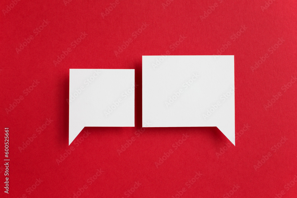 paper speech bubble on red background paper speech bubble on red background