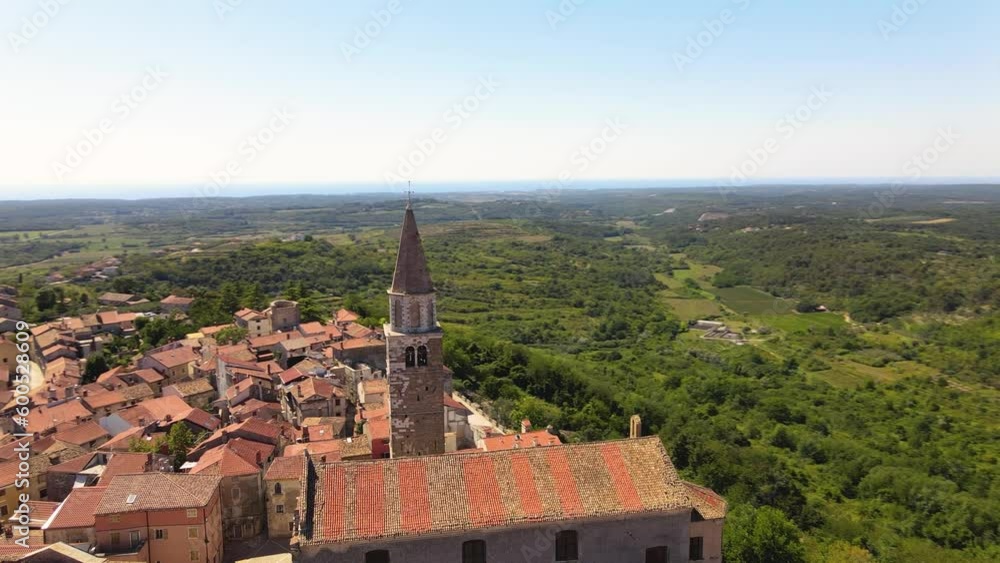 Aerial view of the beautiful medieval city of Buje in Istria, Croatia. Aerial panoramic shot on a sunny summer day. Aerial view of the beautiful medieval city of Buje in Istria, Croatia. Aerial panoramic shot on a sunny summer day.