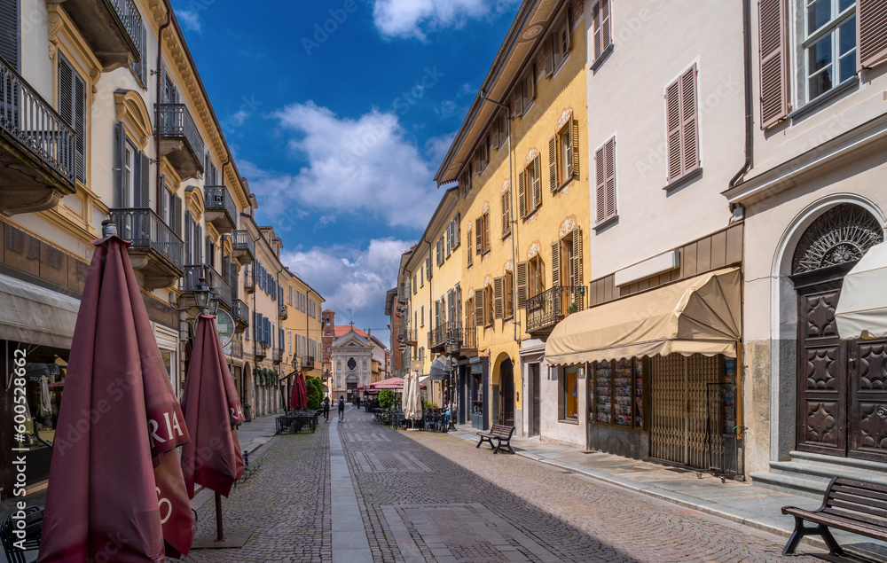 Bra, Cuneo, Piedmont, Italy - May 09, 2023: Via Cavour, central pedestrian street with the church of San Rocco in the background