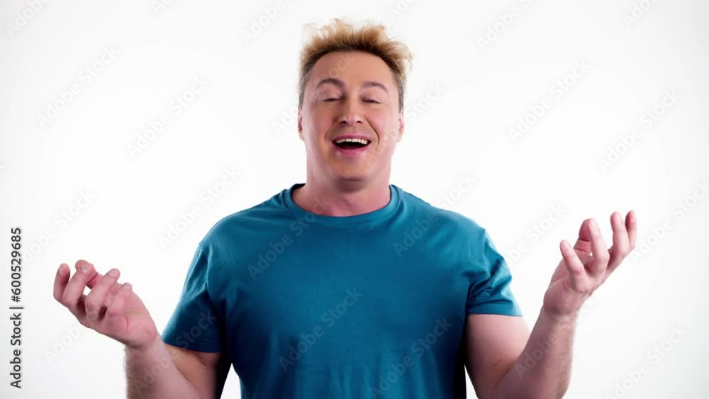 Surprised man with amazed wow expression. Excited guy with open mouth pleasant surprise emotion looking at camera, oh my god. Indoor studio shot isolated on white background. Surprised man with amazed wow expression. Excited guy with open mouth pleasant surprise emotion looking at camera, oh my god. Indoor studio shot isolated on white background.