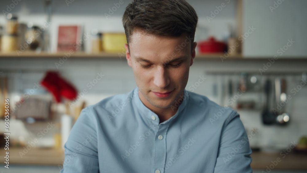 Portrait online manager working at home kitchen satisfied. Man chatting online. Portrait online manager working at home kitchen satisfied. Man chatting online.