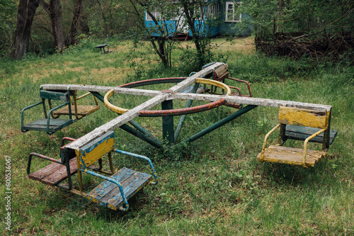 an old abandoned children's swing