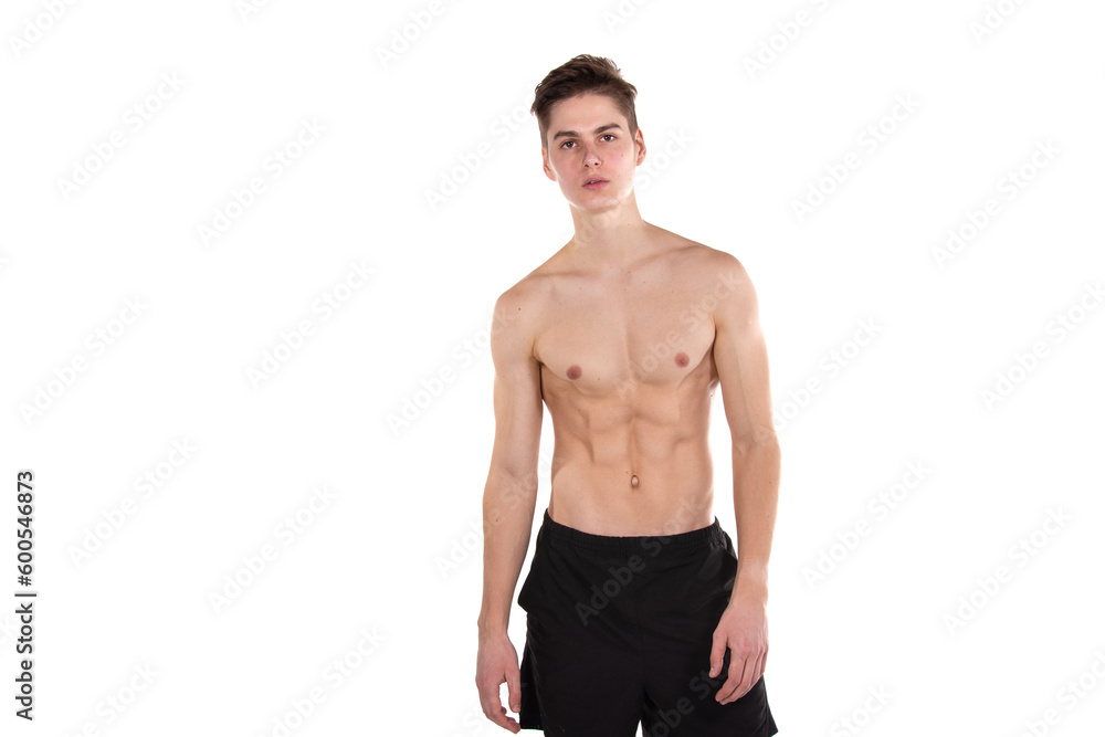 Young attractive guy posing in the studio.	