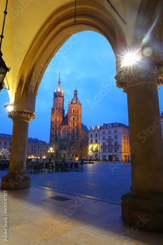 Looking toward St Marys Basilica from the Arches of the Cloth Hall. Krakow, Poland, Europe.