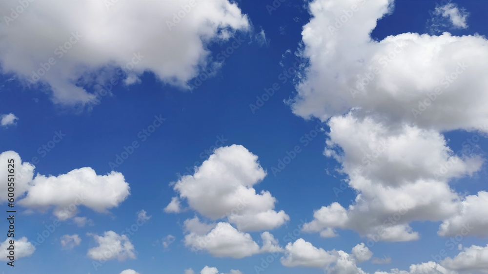 Obraz premium Blue sky with white fluffy cloud. Cloudscape background. The concept of the freedom of life, never give up and new life beginning.