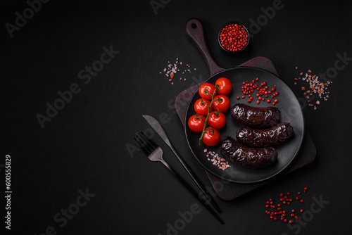 Canvas Print Delicious black blood sausage or black pudding with spices and herbs