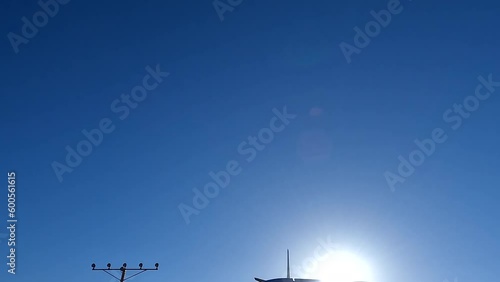  Jet plane landing in silhouette. Tracking shot of airplane landing at dusk. landing plane rear view. Passenger airplane landing. 