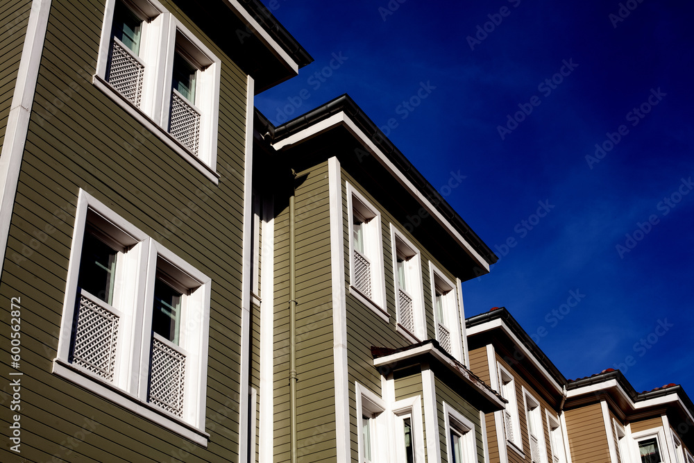 Exterior upper storey house with clear blue sky background