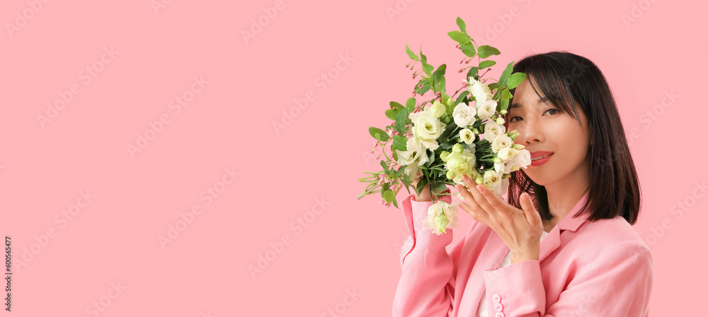 Beautiful Asian woman holding bouquet of eustoma flowers on pink background with space for text Beautiful Asian woman holding bouquet of eustoma flowers on pink background with space for text