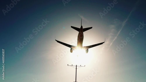 Jet plane approaching landing across sky. Commercial jet plane approach landing. 