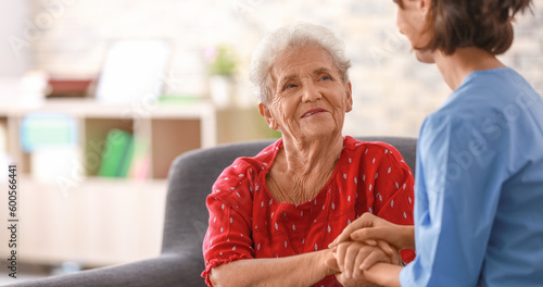 Young nurse visiting elderl...