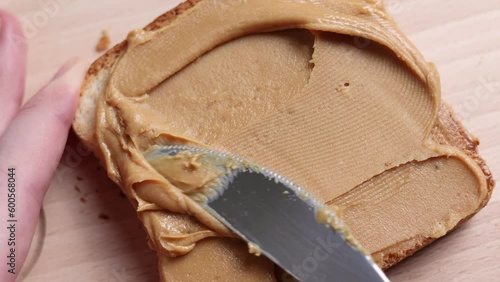 Wallpaper Mural Woman preparing toast with delicious peanut butter  Torontodigital.ca